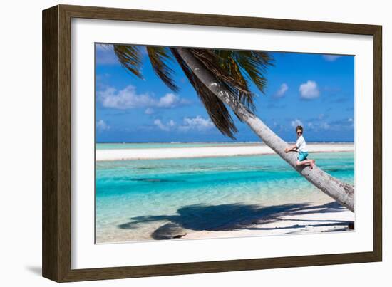 Little Boy Sitting on a Palm at Exotic Beach-BlueOrange Studio-Framed Photographic Print