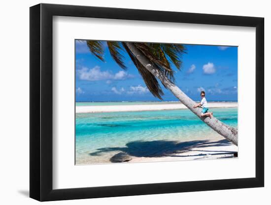 Little Boy Sitting on a Palm at Exotic Beach-BlueOrange Studio-Framed Photographic Print