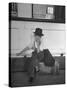 Little Boy Sitting on His Luggage While Waiting For the Train at the Denver Union Station-Sam Shere-Stretched Canvas