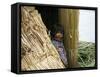 Little Boy, Uros Floating Reed Island, Lake Titicaca, Peru, South America-Jane Sweeney-Framed Stretched Canvas