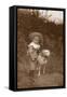 Little Boy with a Bull Terrier in a Garden-null-Framed Stretched Canvas