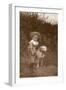 Little Boy with a Bull Terrier in a Garden-null-Framed Photographic Print