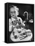 Little Boy with a Toy Dentist Set-Walter Sanders-Framed Stretched Canvas