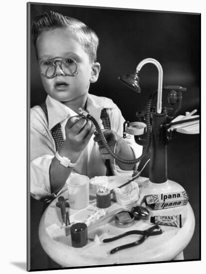 Little Boy with a Toy Dentist Set-Walter Sanders-Mounted Photographic Print