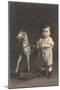 Little Boy with Hobby Horse-null-Mounted Art Print