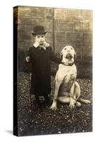 Little Boy with Large Bulldog in a Garden, France-null-Stretched Canvas