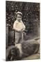 Little Boy with Large Dog in a Garden-null-Mounted Photographic Print