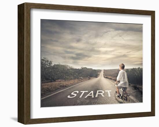 Little Child Pedaling a Bicycle on a Deserted Road-olly2-Framed Photographic Print