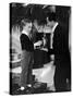 Little English Boy Gets Soda Water from Waiter, St. Moritz, 1931-Alfred Eisenstaedt-Stretched Canvas