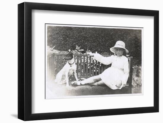 Little Girl and Dog Sitting on a Bench-null-Framed Photographic Print