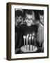 Little Girl Blowing Out Her Candles on Her Birthday Cake-Robert W^ Kelley-Framed Photographic Print