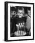 Little Girl Blowing Out Her Candles on Her Birthday Cake-Robert W^ Kelley-Framed Photographic Print