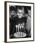 Little Girl Blowing Out Her Candles on Her Birthday Cake-Robert W^ Kelley-Framed Photographic Print