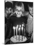 Little Girl Blowing Out Her Candles on Her Birthday Cake-Robert W^ Kelley-Mounted Photographic Print