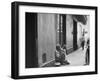 Little Girl Cleaning Face of a Street Beggar-null-Framed Photographic Print