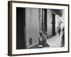 Little Girl Cleaning Face of a Street Beggar-null-Framed Photographic Print