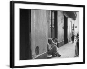 Little Girl Cleaning Face of a Street Beggar-null-Framed Photographic Print