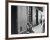 Little Girl Cleaning Face of a Street Beggar-null-Framed Photographic Print