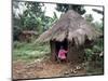 Little Girl Dressed for Church, in Front of Hut, Uganda, East Africa, Africa-D H Webster-Mounted Photographic Print