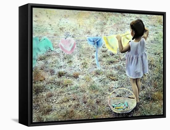 Little Girl Hanging Laundry-Nora Hernandez-Framed Stretched Canvas