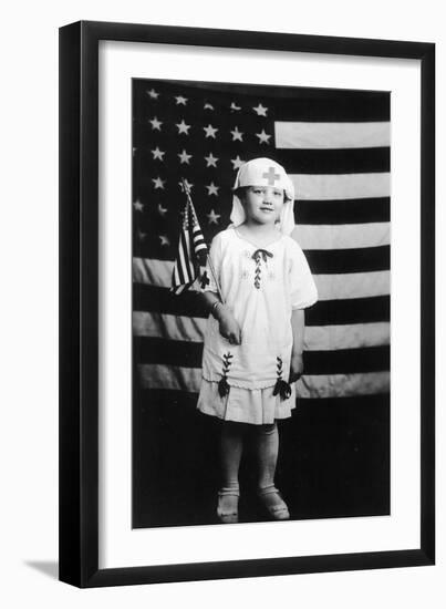 Little Girl in Nurses Outfit Holding US Flag-Lantern Press-Framed Art Print