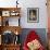 Little Girl in Yellow Dress with Basket of Fruit-null-Framed Photographic Print displayed on a wall