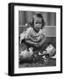 Little Girl Leaning over Her Broken Piggy Bank-Nina Leen-Framed Photographic Print