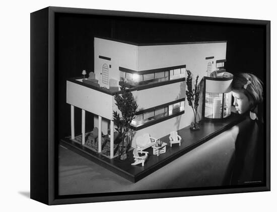 Little Girl Looking Into a Modern Doll House Being Sold at F.A.O. Schwarz-Herbert Gehr-Framed Stretched Canvas