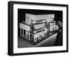 Little Girl Looking Into a Modern Doll House Being Sold at F.A.O. Schwarz-Herbert Gehr-Framed Photographic Print