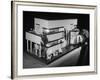 Little Girl Looking Into a Modern Doll House Being Sold at F.A.O. Schwarz-Herbert Gehr-Framed Photographic Print