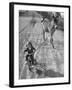 Little Girl Riding Her Tricycle, Leading Francis the Mule-Allan Grant-Framed Photographic Print