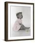 Little Girl Sitting and Laughing with a Floral Ring on Head and Two Flowers in Front of Her-Nora Hernandez-Framed Giclee Print