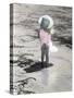 Little Girl Standing at Edge of Water with Pail over Her Head-Nora Hernandez-Stretched Canvas