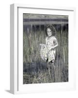 Little Girl Standing in Pond Surrounded by Tall Grass-Nora Hernandez-Framed Giclee Print