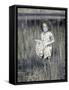 Little Girl Standing in Pond Surrounded by Tall Grass-Nora Hernandez-Framed Stretched Canvas