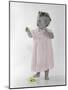 Little Girl Standing with Ring of Flowers on Head Holding Another Flower-Nora Hernandez-Mounted Giclee Print