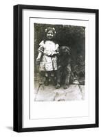 Little Girl with a Dog in a Garden-null-Framed Premium Photographic Print