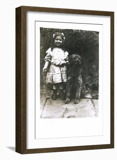 Little Girl with a Dog in a Garden-null-Framed Photographic Print