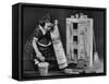 Little Girl with a Toy House Cleaning Kit-Walter Sanders-Framed Stretched Canvas