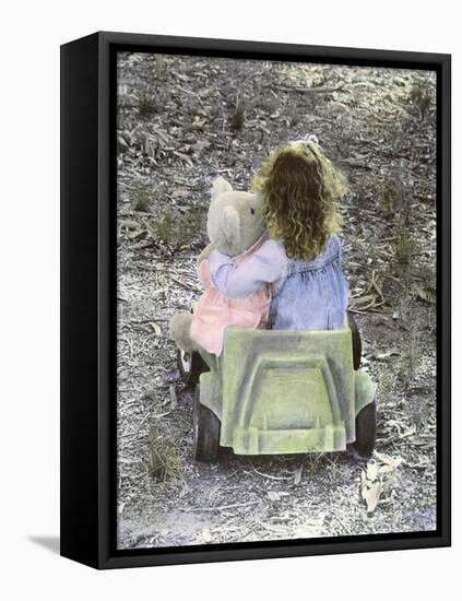 Little Girl with Her Teddy Bear Riding in a Toy Car-Nora Hernandez-Framed Stretched Canvas