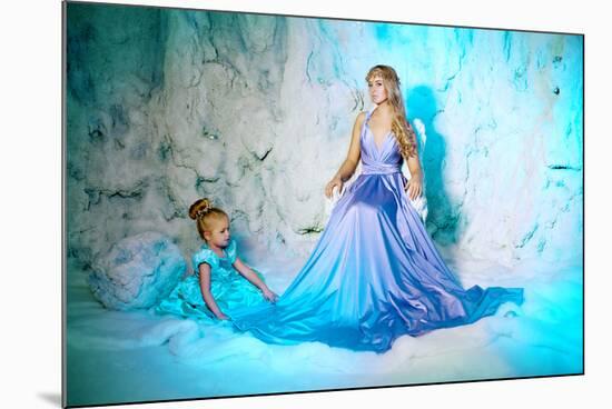 Little Girl with Mother in Princess Dress on a Background of a Winter Fairy Tale. Baby and Mom Snow-Miramiska-Mounted Photographic Print