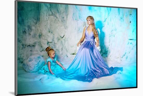 Little Girl with Mother in Princess Dress on a Background of a Winter Fairy Tale. Baby and Mom Snow-Miramiska-Mounted Photographic Print