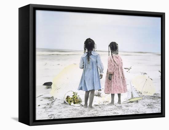 Little Girls on Beach with Flowers and Toy Sail Boat-Nora Hernandez-Framed Stretched Canvas