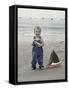 Little Kid on Beach with Toy Sailboat-Nora Hernandez-Framed Stretched Canvas