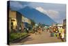 Little Village before the Towering Volcanoes of the Virunga National Park, Rwanda, Africa-Michael-Stretched Canvas