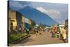 Little Village before the Towering Volcanoes of the Virunga National Park, Rwanda, Africa-Michael-Stretched Canvas