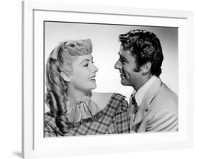 LITTLE WOMEN, 1949 directed by MERVYN LeROY Elizabeth Taylor and Peter Lawford (b/w photo)-null-Framed Photo