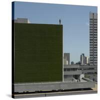 Living Wall, on National Theatre, Southwark, London. Figures, Event Horizon, by Antony Gormley-Richard Bryant-Stretched Canvas