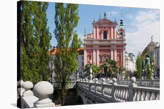 Ljubljana, Slovenia. Presernov trg (or square) and the Baroque Franciscan Church of the Annuncia...-null-Stretched Canvas