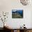 Llama Rests Overlooking Ruins of Machu Picchu in the Andes Mountains, Peru-Jim Zuckerman-Framed Stretched Canvas displayed on a wall